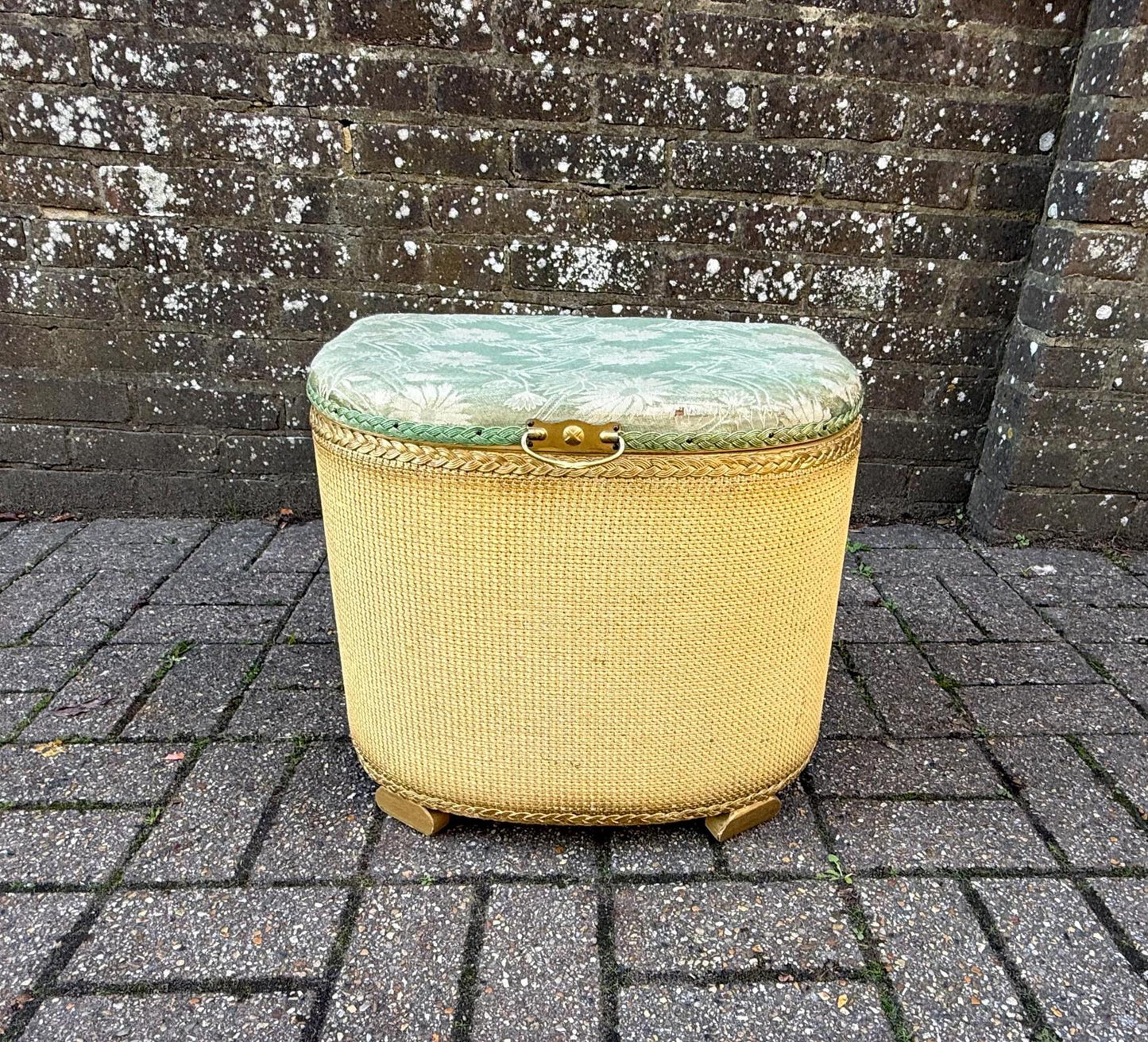 gold wicker basket or box, with upholstered green seat. VGC 1950s laundry basket. lloyd loom style