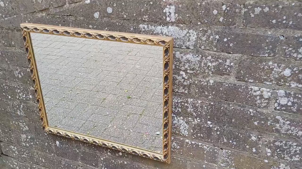 Large Vintage 60s Gold and Black Ornate Wall Mirror.